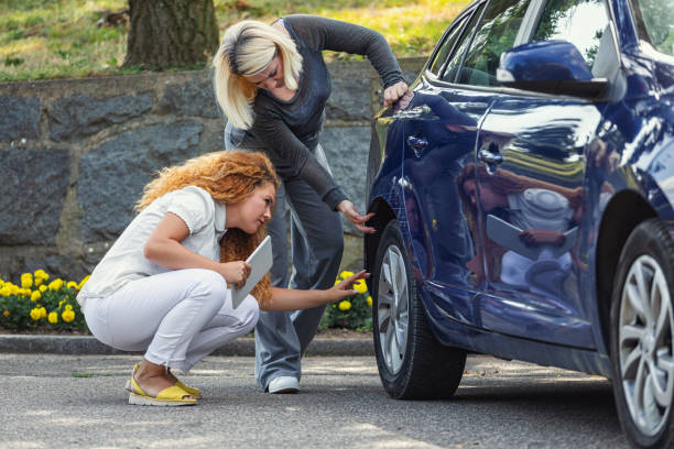 istock Claims adjuster helping out an unfortunate driver 2041143709