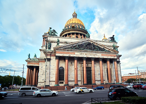 Saint Petersburg, Russia - June 03, 2023: St. Isaac's Cathedral is the largest cathedrals in the world on a cloudy day, St. Petersburg, Russia. Blue cloudy sky