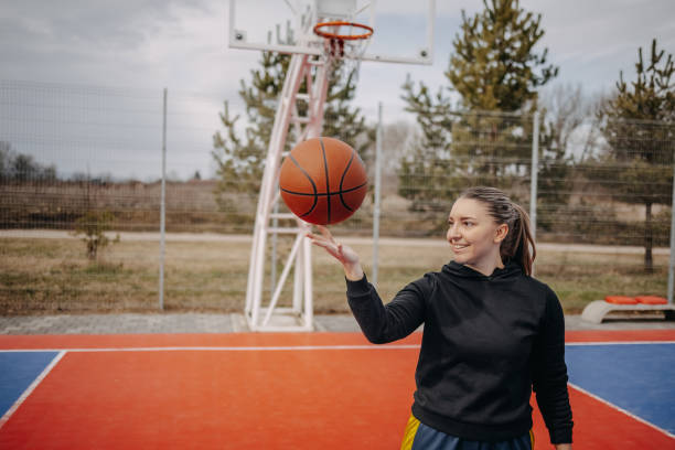 istock Young female training basketball 2041196756