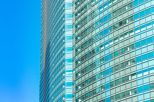 Abstract modern architecture. Two white office towers perspective on blue sky background. 3d render illustration