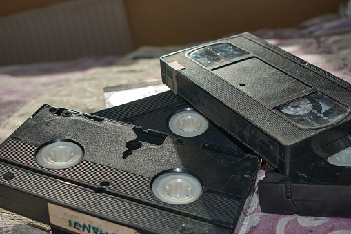 old VHS video cassettes, video tape cassette, old technology concept,