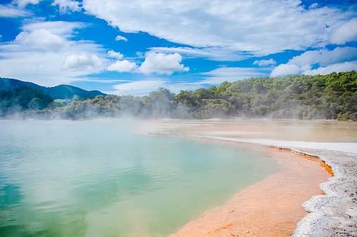 Wai-o-Tapu Rotorua New Zealand Multicoloured rocks reveal themselves beneath the water at Champagne Pool