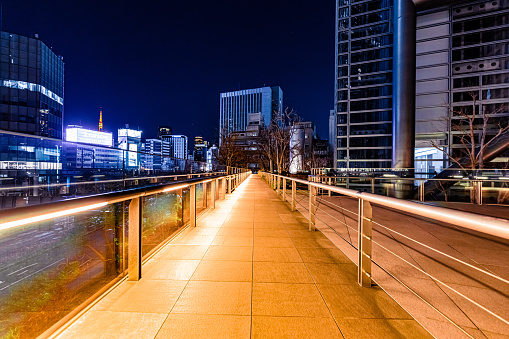 Skyscrapers in Shiodome and footbridge in Tokyo