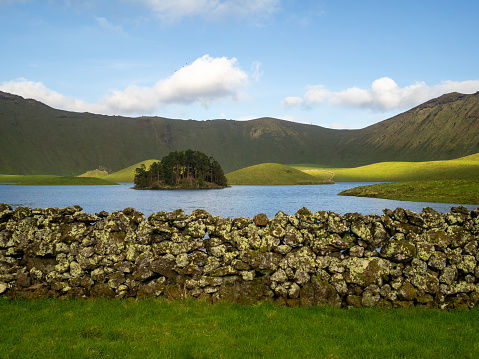 Stone wall by the lake in Caldeirão do Corvo, Azores