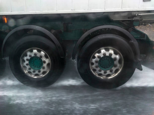dangers driving near trucks - hydroplaning стоковые фото и изображения