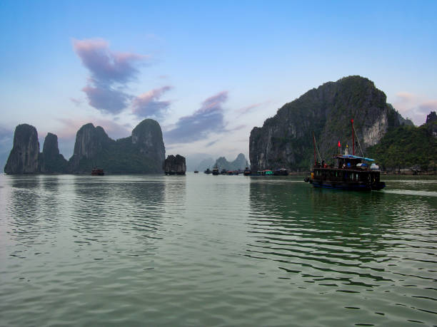 istock Ha Long Bay with Tour Boat and Several Mountains 2041343719