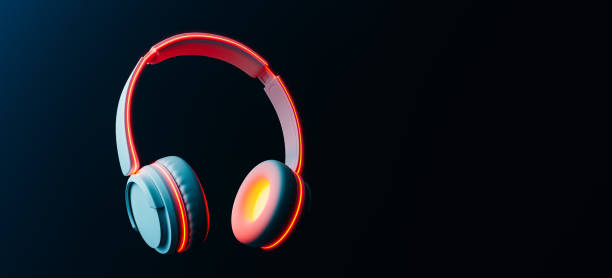 istock Headphones that play music that glows with intense neon light.3d rendering 2041383587