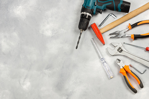 Various repair tools, hardware materials, drill, hammer, pliers, screwdriver, wrench