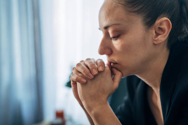 istock A person clasps their hands during a therapy session 2041420901
