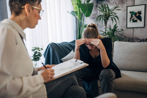 istock A moment of vulnerability during a therapy session. 2041447906