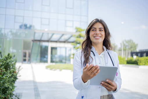 Portrait of a female doctor outdoors