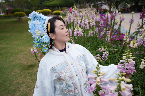 A woman dressed as a girl in Qianpu, Quanzhou, China