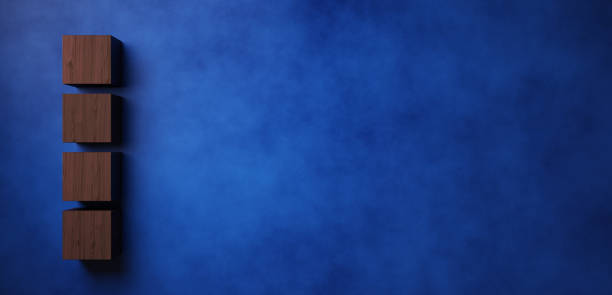 istock 3D Illustration.Wooden cube on blue speckled background. Copy space. (horizontal) 2041602445