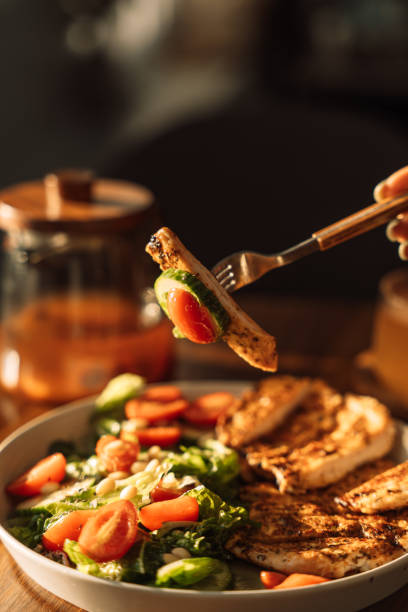 istock Light breakfast with chicken and vegetables in front of the kettle 2041612897