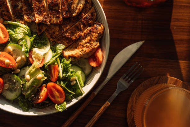 istock Light breakfast with chicken and vegetables with a mug of tea 2041612919