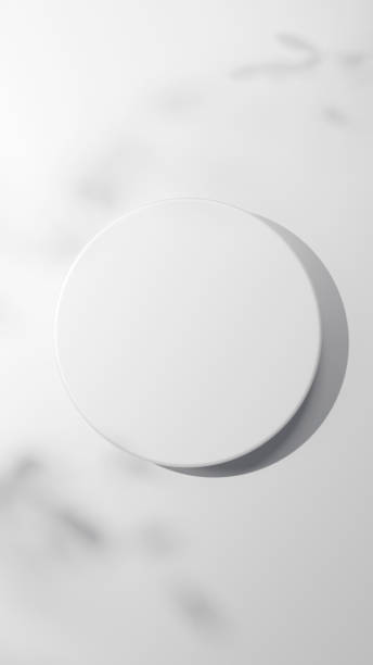 istock 3D Illustration.White column base on white background. Shadow of tree leaves. (overhead) (Vertical) 2041626464