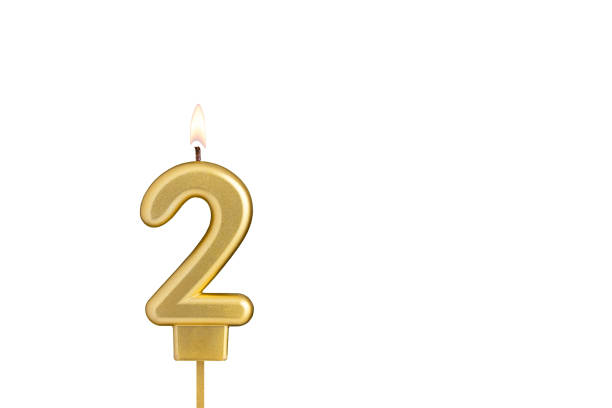 istock Birthday candle number 2 on white background 2041660249