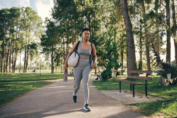 istock Woman arriving at the park to exercise 2041736264