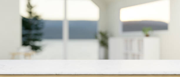 istock An empty space for display product on a white tabletop in a modern white living room. 2041763092