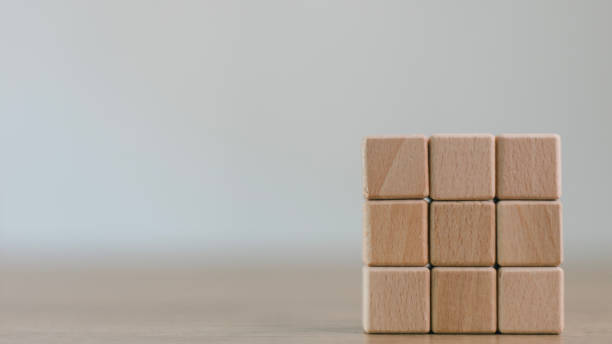 istock Blank wooden cubes on the table with copy space, empty wooden cubes for input wording, and an infographic icon. 2041763617