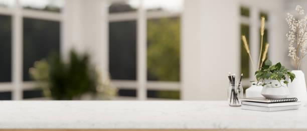istock A table with empty space for display product with a blurred background of a modern white living room 2041764120
