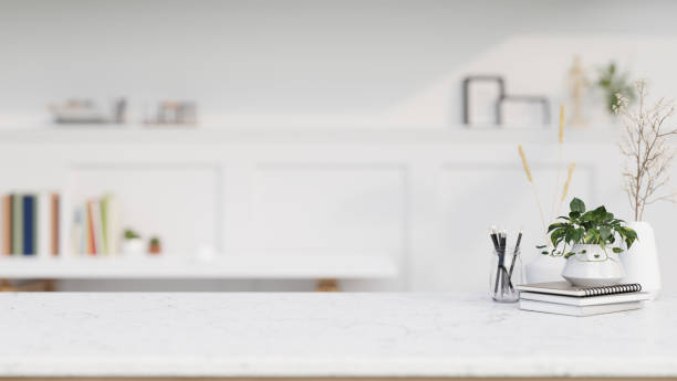 istock A copy space for display product on a white marble tabletop in a contemporary white home office. 2041771341