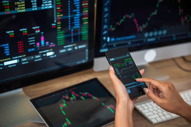 Businessman checking stock market data.