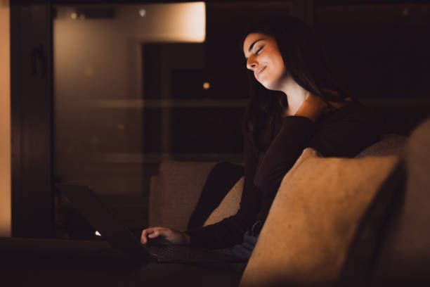 istock Stressed woman at late night having strong terrible neckache attack after computer laptop study, sleepy exhausted girl suffering from chronic migraine massaging muscle to relieve neck ache tension 2041858685