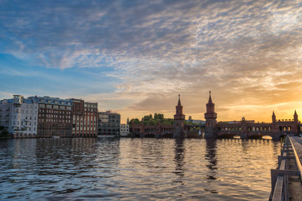 istock Berlin Germany, sunset city skyline at Oberbaum Bridge and Spree River 2041865459