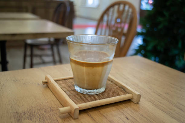 istock Coffee time with dirty coffee glass on table 2041868193