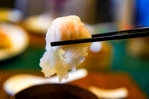 Closeup image of the ready-to-eat dim sum menu, Shrimp Hakao (Shrimp dumplings), on the dining table.