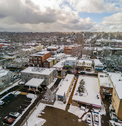 Snowy winter landscape along Greenwood Ave in a residential area of Madison, New Jersey. Panoramic stitched image