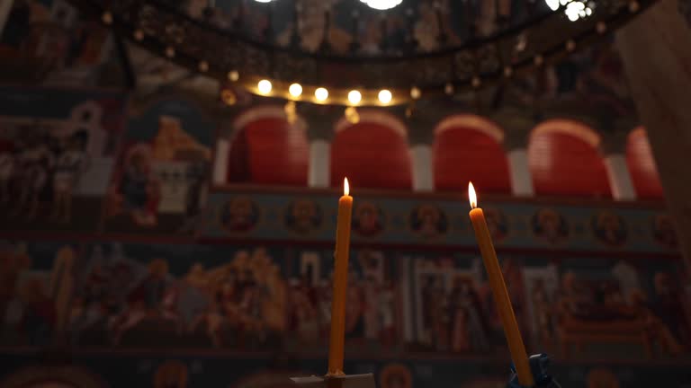 Lighting candles in Orthodox Church