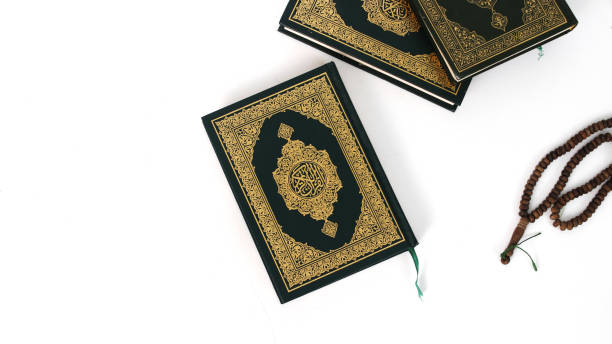 istock Holy Quran, Tasbih, White Background 2041979417
