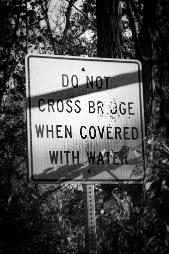 Do not cross bridge road sign