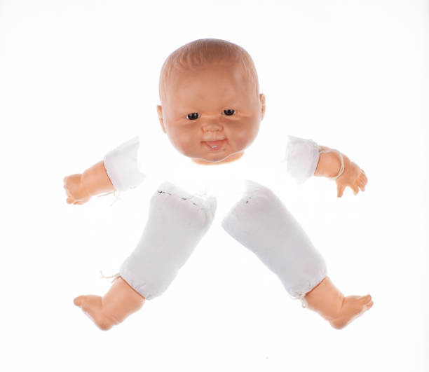 istock broken parts of a doll isolated on white background 2042029672