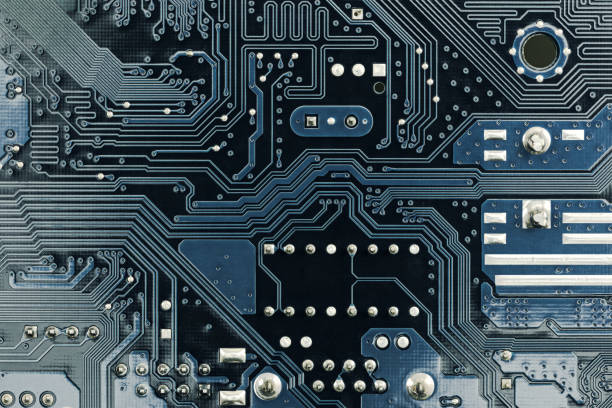 istock back side of computer mother board. circuit board connections. high-detailed background. 2042051071