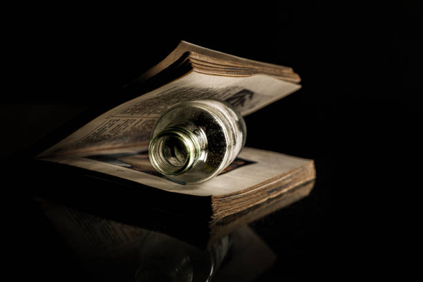 A glass bottle between the pages of a book