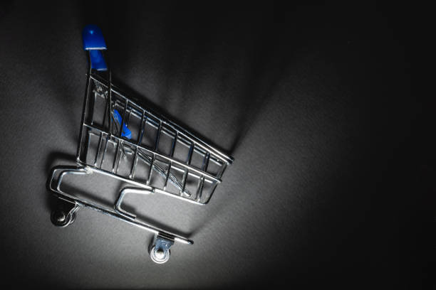 Chained shopping cart with padlock. Banned shopping and sanctions concept.