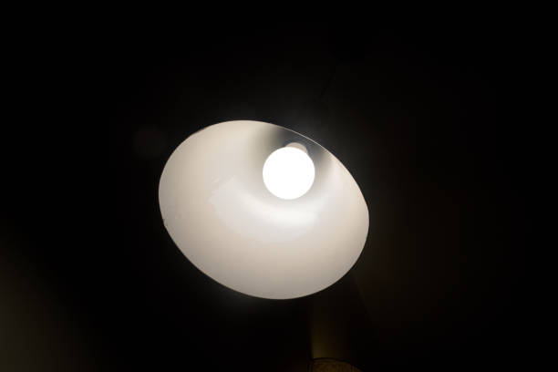 istock Beautiful white light lamp in room. 2042219205