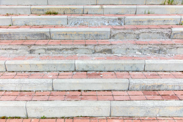 Broken red brick stairs in the city, abstract background for design.