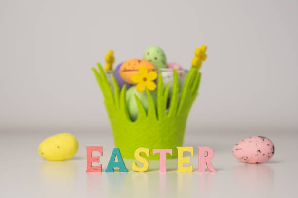 Easter greetings card with flowers and eggs in the background. spring celebration. High quality photo