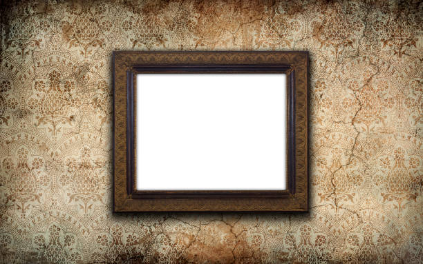 istock Vintage picture frame with blank space on an old wall 2042265251