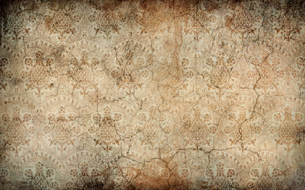 istock Worn wallpaper with floral patterns on dirty, cracked wall. Backgrouds and textures. Copy space, add text illustration 2042266311
