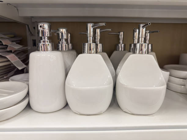 Box of Soap, shampoo, conditioner hang on marble wall in bathroom