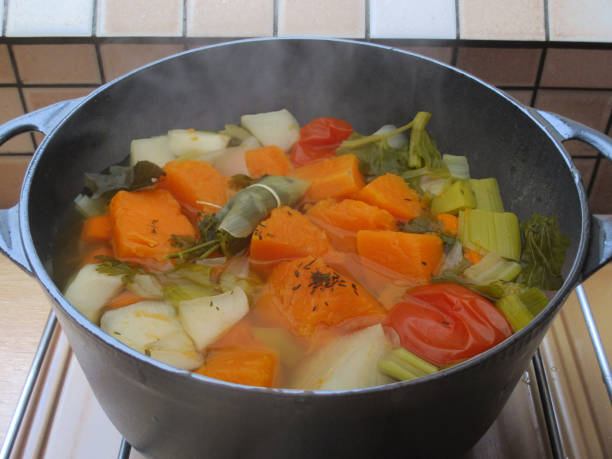 istock Pumpkin and vegetable soup being cooked in a casserole dish 2042321051