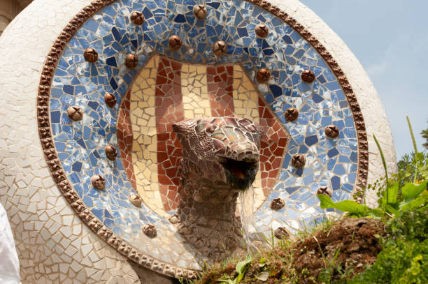 Colorful mosaics of broken tiles form swirling circles, abstract fields, and playful figures.