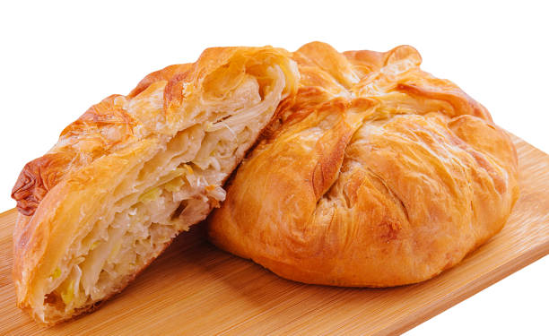 istock Baking puff pastry with fresh cabbage on wooden 2042354373