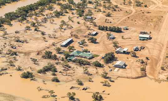 Aerial photograph of the town of Birdsville in Queensland Australia, surrounded by flood waters
