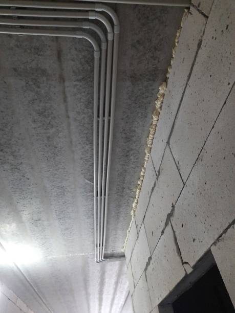 istock Installation of plastic fogging tubes for the electrical network. 2042364856